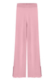 Knitted pants with cuts