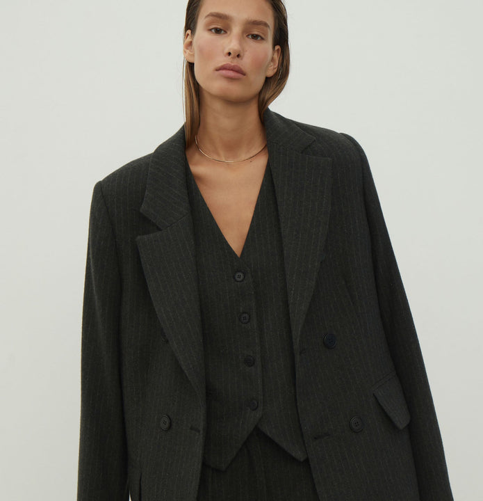 Double-breasted woolen jacket in a gray-green stripe