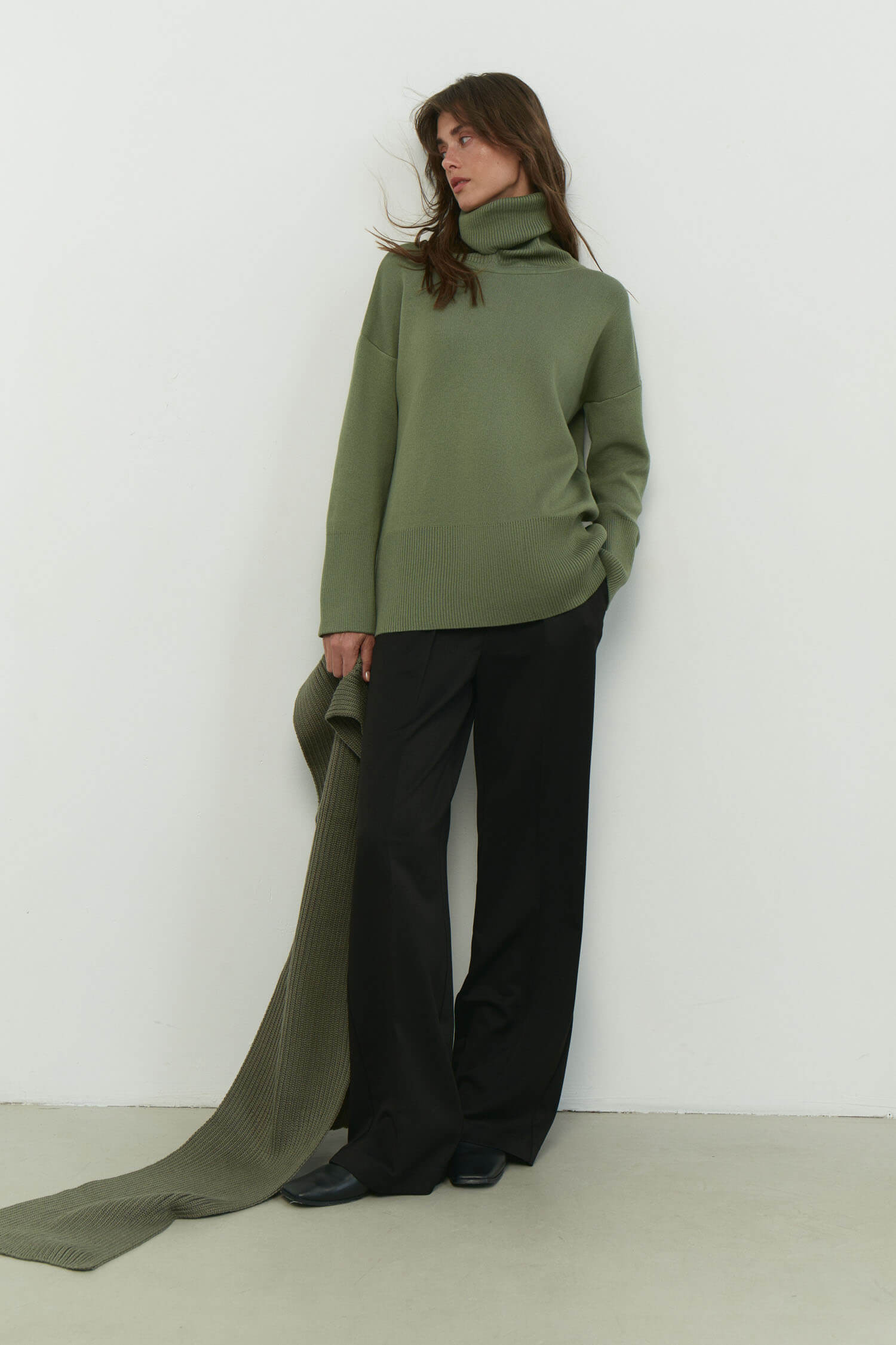 Knitted sweater with a voluminous neck