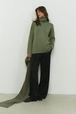 Knitted sweater with a voluminous neck