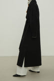The straight-cut coat in black color
