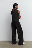 Palazzo pants with double tucks in gray/black