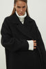 The straight-cut coat in black color