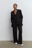 Palazzo pants with double tucks in gray/black