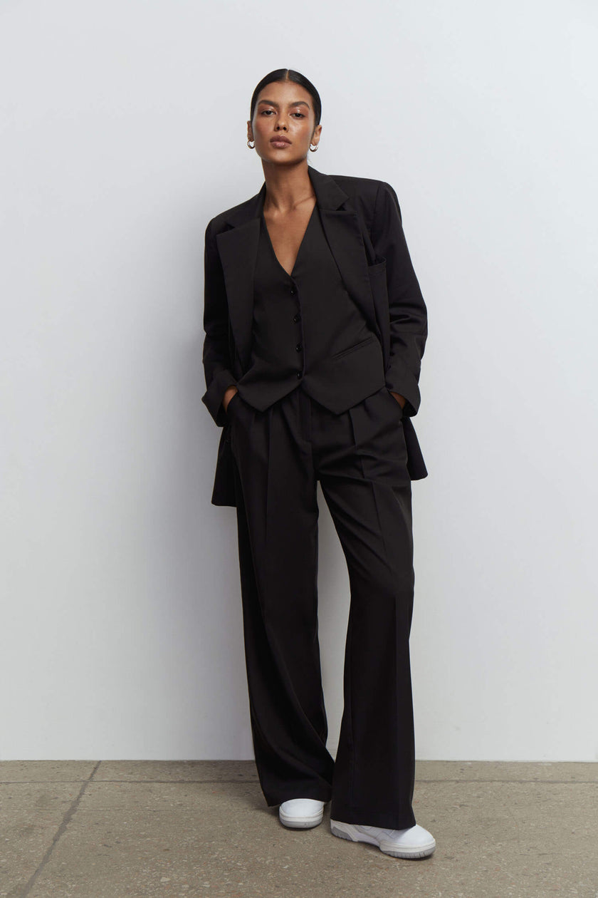 Palazzo pants with double tucks in gray/black