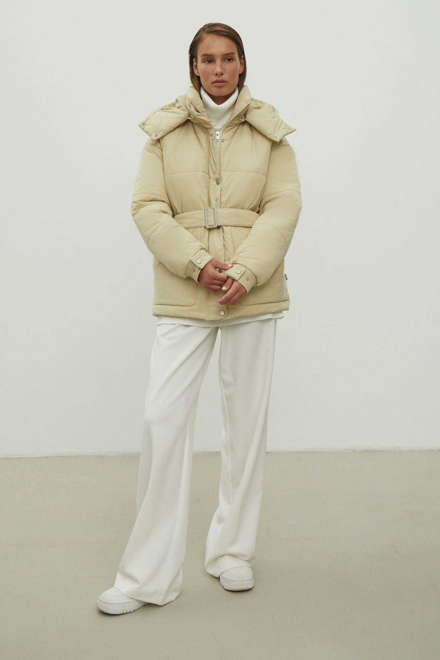 Women's jacket with a belt