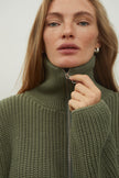 Oversized knitted sweater with a zipper in gray color