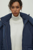 Women's jacket with a belt