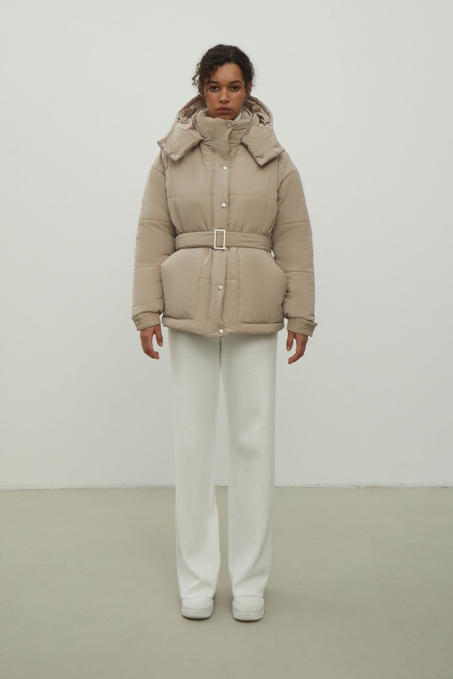Women's jacket with a belt