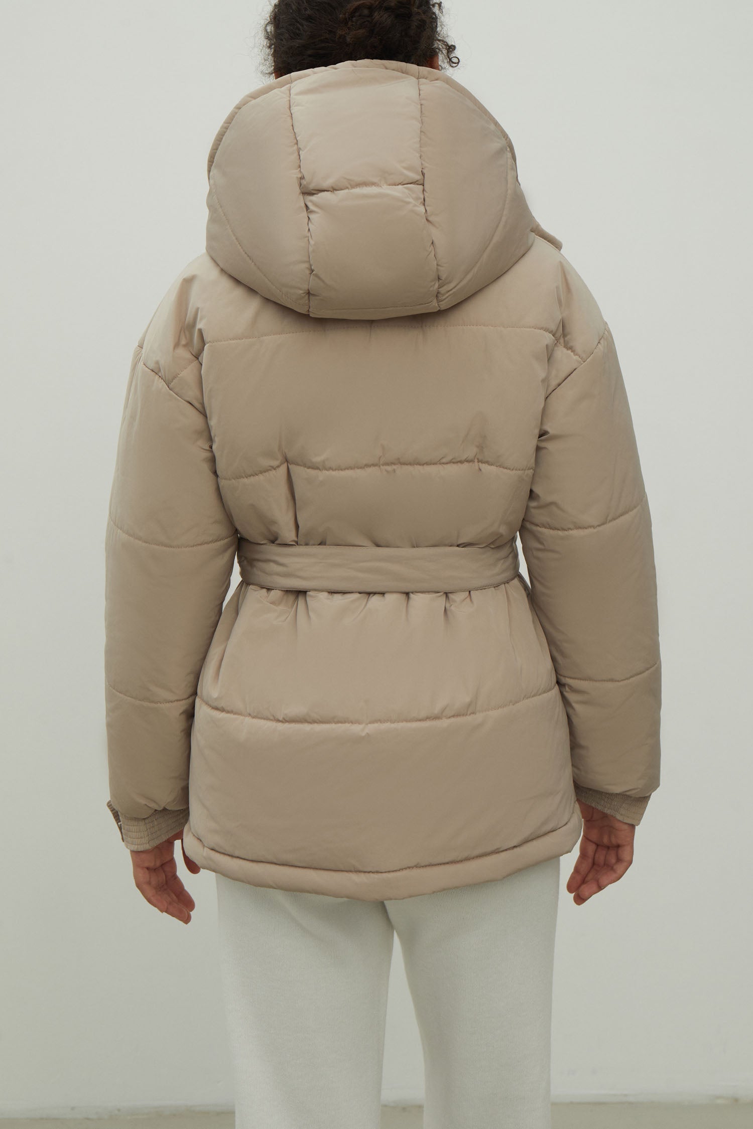 Women's jacket with a belt