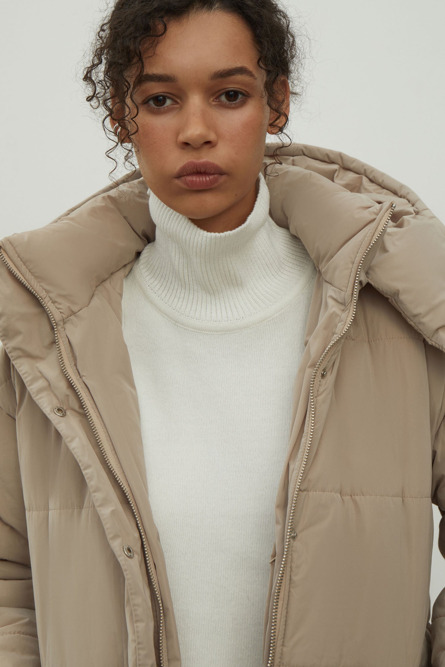 Women's jacket with a belt