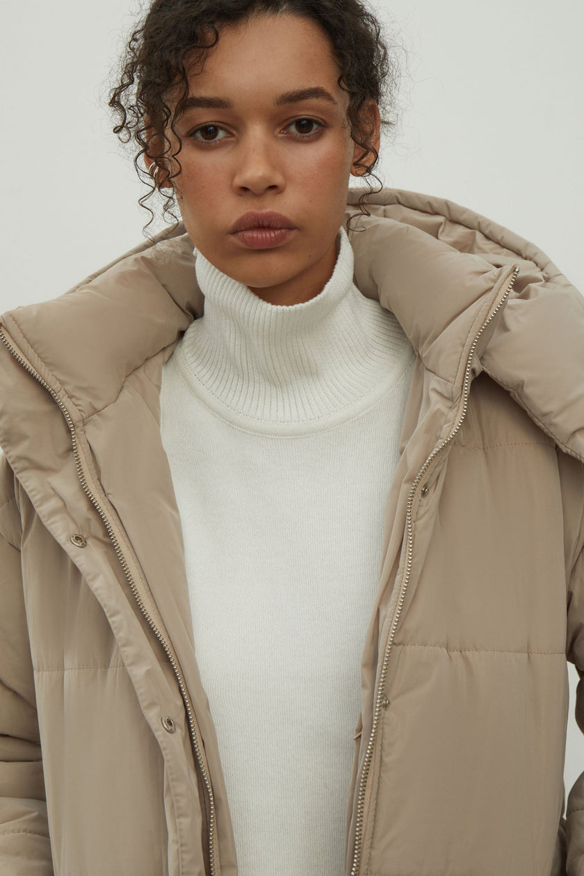 Women's jacket with a belt