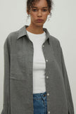 Shirt with a pocket in a beige check gray