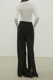Woolen palazzo pants with a decorated belt in dark gray