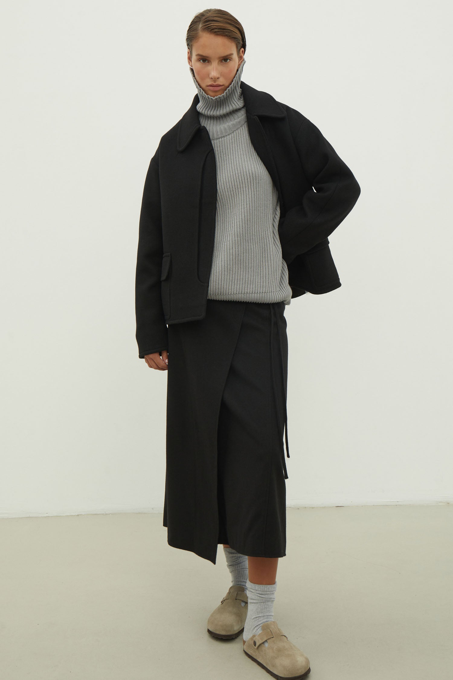 Black short wool coat with patch pockets