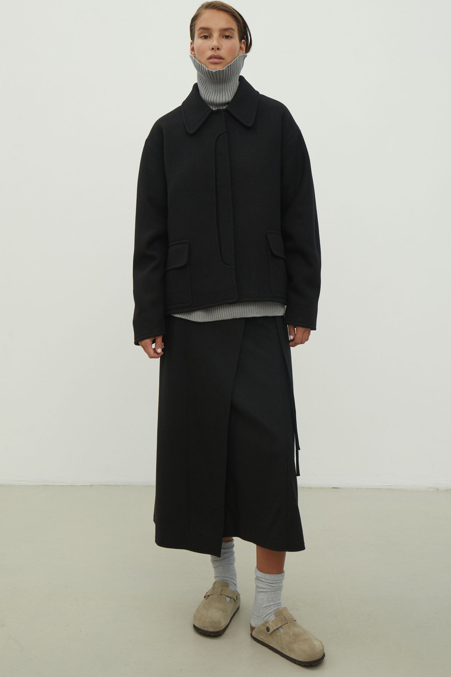 Black short wool coat with patch pockets