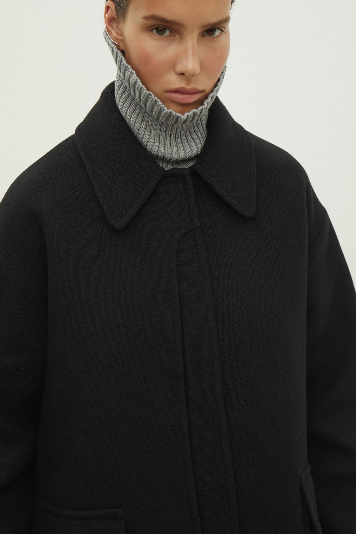 Black short wool coat with patch pockets
