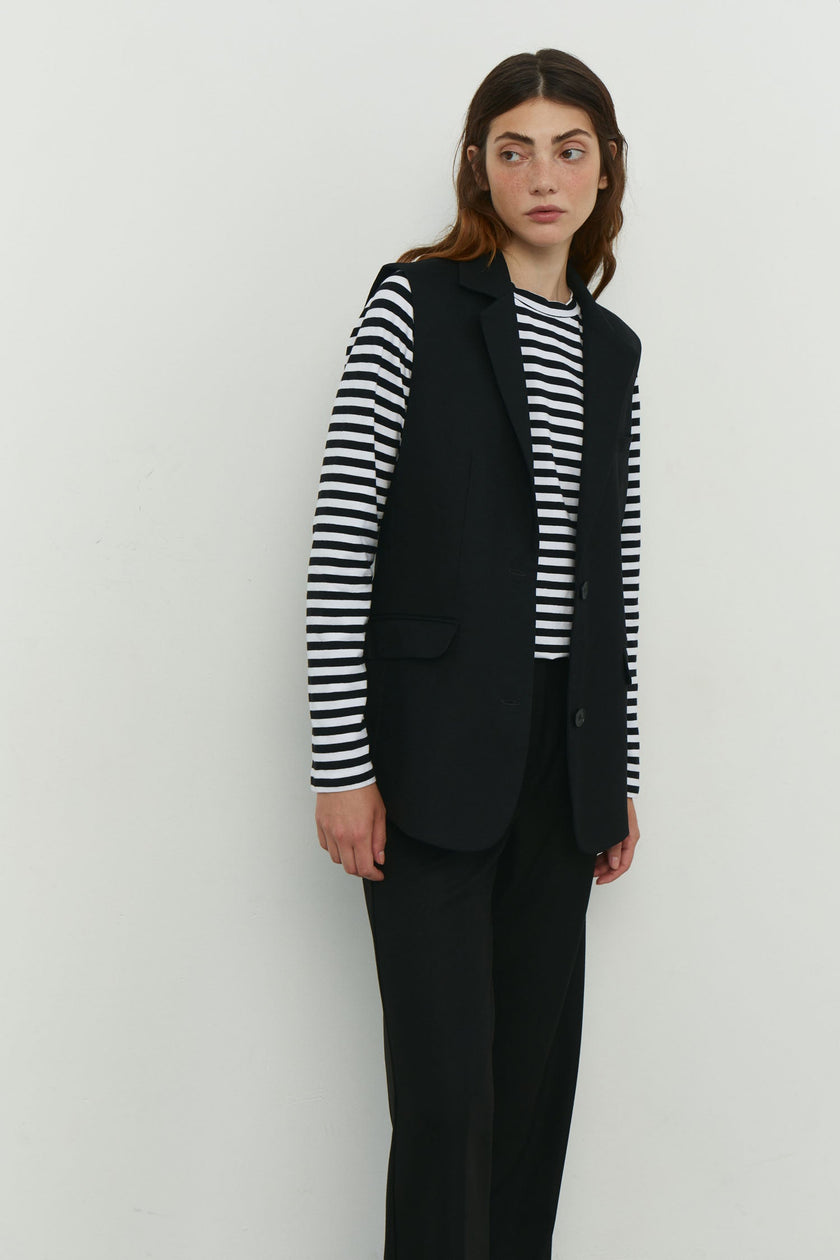 Elongated vest with costume fabric in black