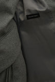 Single-breasted woolen jacket with a tie in gray