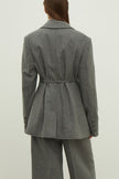 Single-breasted woolen jacket with a tie in gray