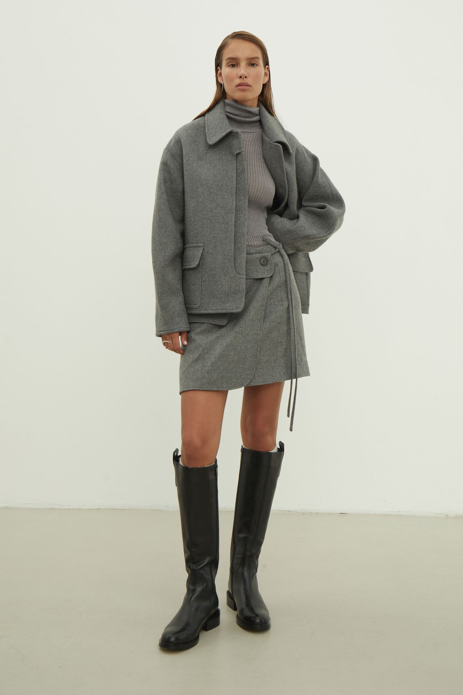 Black short wool coat with patch pockets