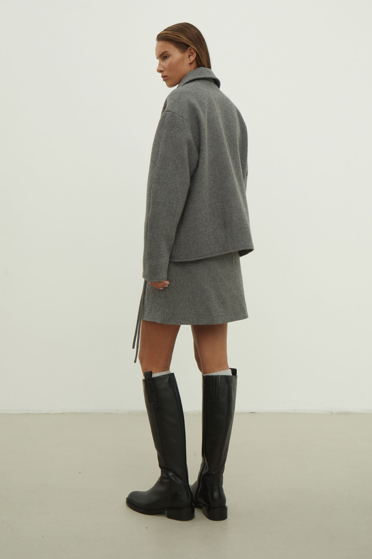 Black short wool coat with patch pockets