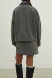 Black short wool coat with patch pockets