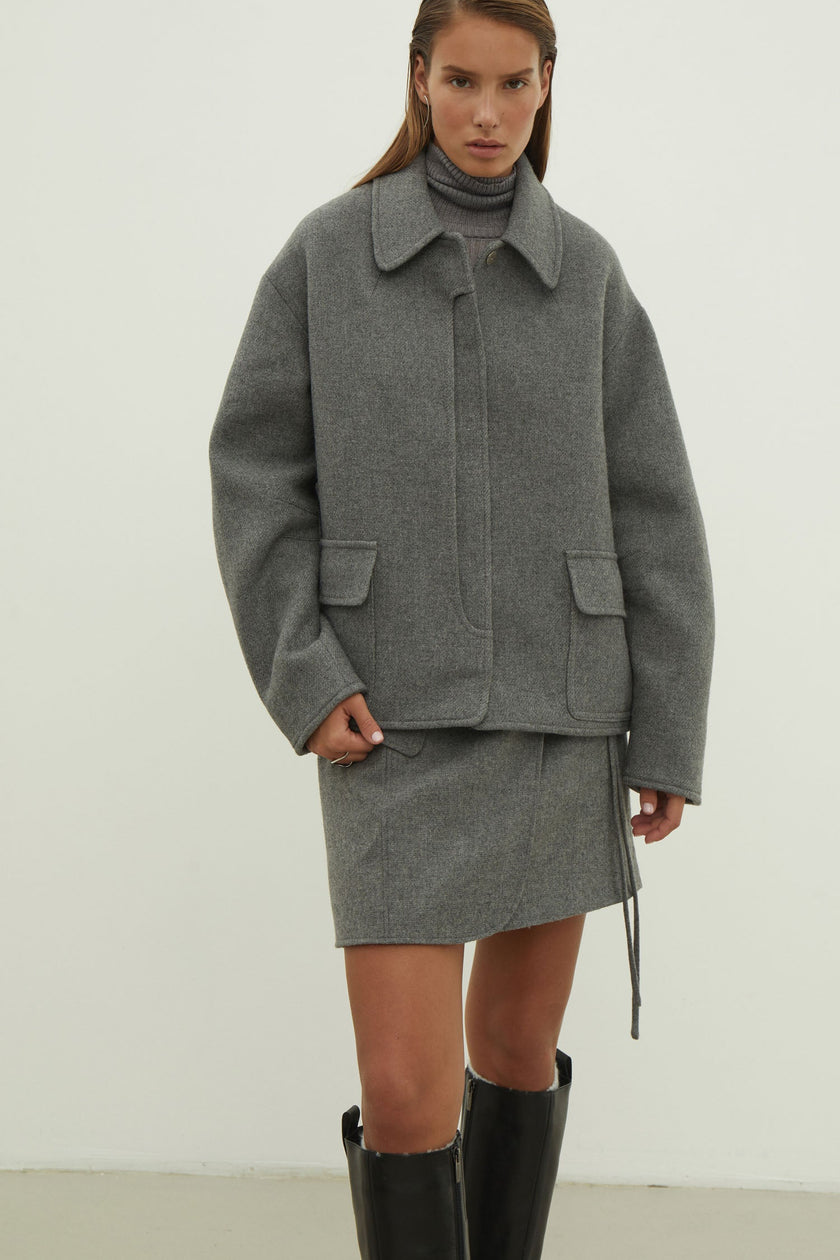 Black short wool coat with patch pockets