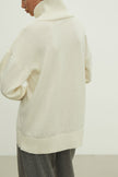 Merino wool sweater with neckline in milk