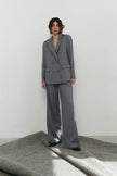 Palazzo pants with double tucks in gray/black