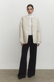 Quilted jacket with a belt