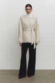 Quilted jacket with a belt
